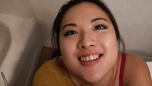 Asian Girl Does Her Best While Sucking Cock In The Bathroom While Friends In The Other Room